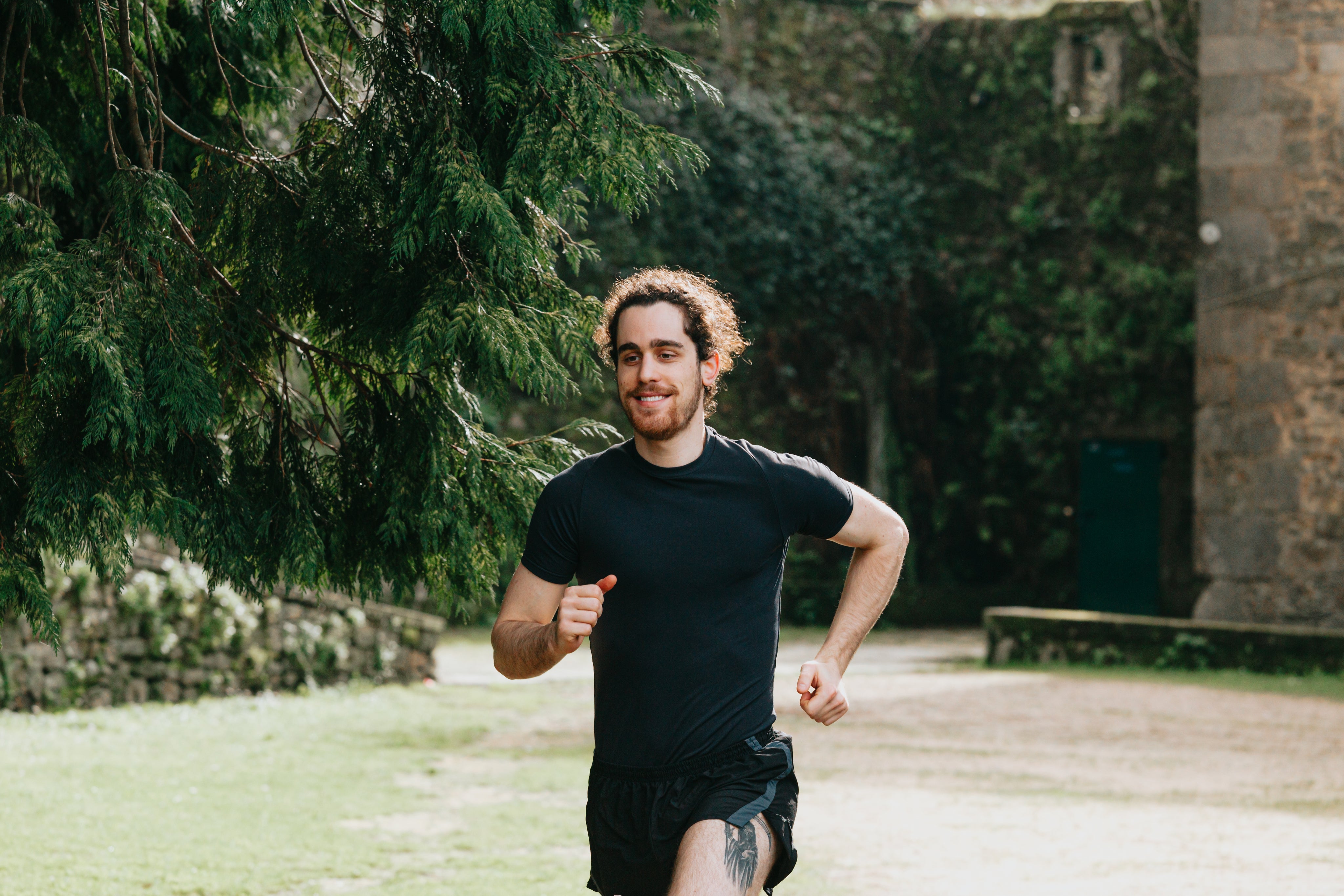 files/man-in-black-out-for-a-run-through-green-trees.jpg